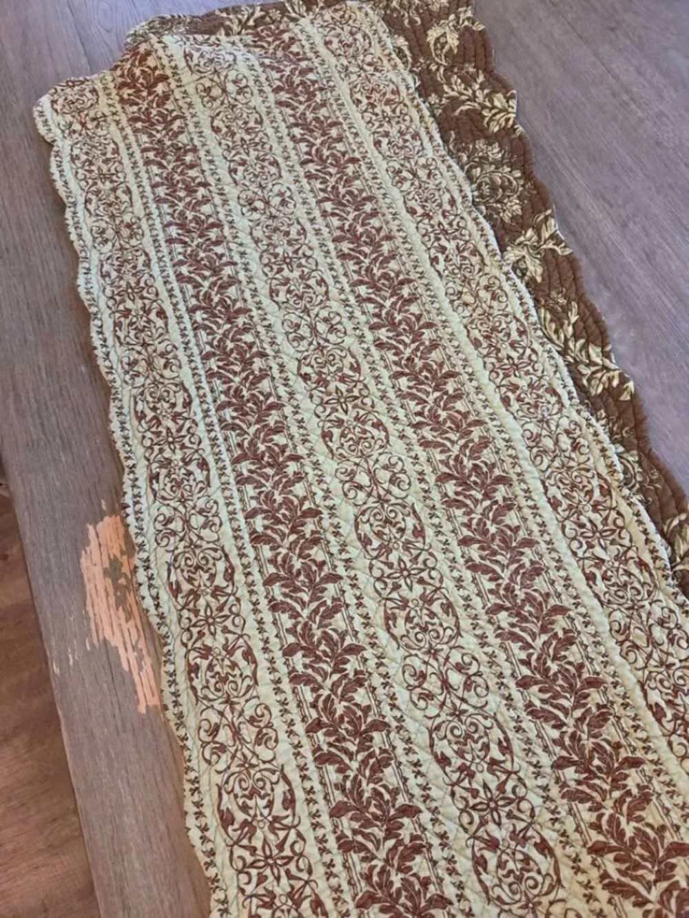 Brown and green quilted table runner
